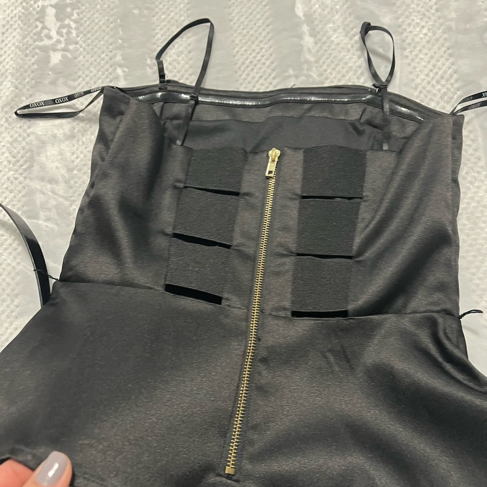 XOXO Black top with belt.